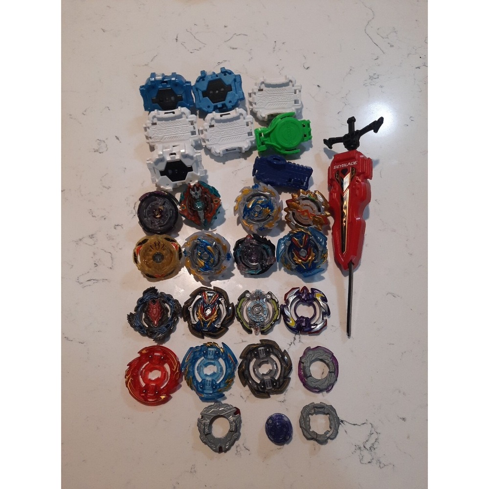 Lot Of 8 Beyblade And Different Parts